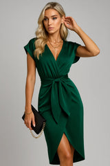 Chic emerald green wrap dress with waist tie, perfect for cocktail and evening occasions